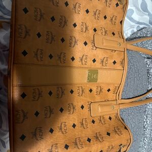 Authentic MCM Reversible large bad and pouch